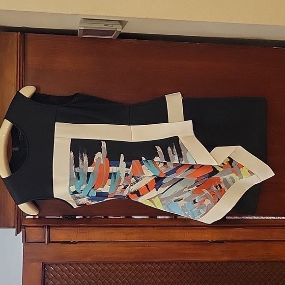 BCBGMaxAzria Dresses & Skirts - BCBGMaxAzria Sleeveless "Alessandra" Asymmetrical Handkerchief Peplum Mini Dress